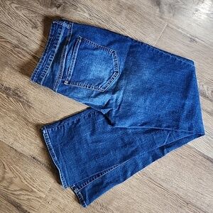 Womens SO brand jeans darker in color low rise bootcut 17/33w